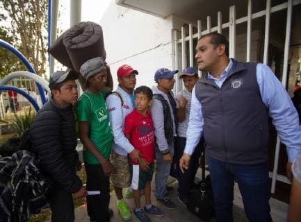 November 15, 2018 - San Diego, California, USA - Young men waited outside the temporary shelter set up at the Unidad Deportiva Benito Juarez, a municipal gym in Tijuana, hoping to get inside for the evening. San Diego USA - ZUMAs44_ 20181115_zaf_s44_007 Copyright: xNelvinxC.xCepedax