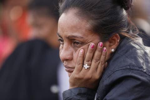 November 15, 2018 - San Diego, California, USA - A woman hoping for a place to stay, waits outside the temporary shelter set up at the Unidad Deportiva Benito Juarez in Tijuana. San Diego USA - ZUMAs44_ 20181115_zaf_s44_006 Copyright: xNelvinxC.xCepedax