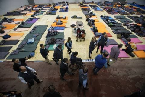 November 15, 2018 - San Diego, California, USA - Baja California state official gets a tour of the temporary shelter set up at the Unidad Deportiva Benito Juarez, a municipal gym in Tijuana, for some of the Central American migrants that have arrived recently. San Diego USA - ZUMAs44_ 20181115_zaf_s44_003 Copyright: xNelvinxC.xCepedax