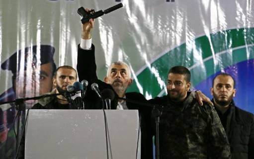November 16, 2018 - Khan Younis, Gaza Strip, Palestinian Territory - Hamas s leader in the Gaza Strip Yahya Sinwar attends a memorial service for seven members of Ezzedine al-Qassam Brigades, the armed wing of the Palestinian Hamas movement who were killed during an Israeli special forces operation in the Gaza Strip last week, in Khan Younis in southern Gaza Strip on November 16, 2018 Khan Younis Palestinian Territory - ZUMAap3_ 20181116_zaf_ap3_180 Copyright: xAshrafxAmrax