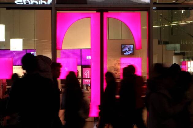 Telekom branch on the pedestrian zone Zeil in the evening in Frankfurt Hessen Germany