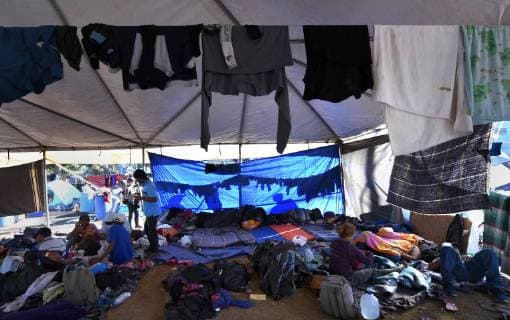 November 26, 2018 - Tijuana, Mexico - The migrant caravan camp Centro Deportivo Benito Juarez seemed more somber on November 26, 2018the day after chaos and U.S. agents firing tear gas at them when they broke through Mexican police line during a protest march and ran to the U.S. border. Some were caught there yesterday to be deported and there was a rumor in the camp all would be sent back to Honduras today which led some to pack and leave to stay on the streets rather than return. Others opted to take the offer of assistance going back. Many appeared to realize that the hope they held to begin a new life in America had dimmed. Men were applying for work visas realizing the stay in Mexico may be longer than anticipated if at all. Tijuana Mexico - ZUMAg208 20181126_zap_g208_014 Copyright: xCarolxGuzyx