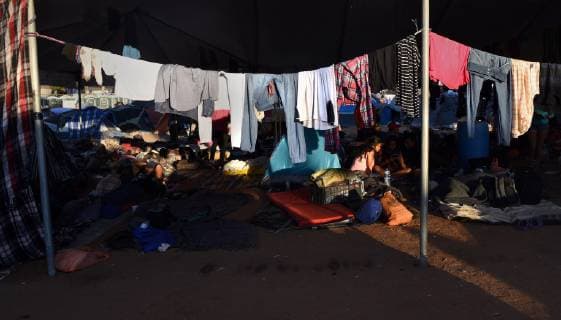 November 26, 2018 - Tijuana, Mexico - The migrant caravan camp Centro Deportivo Benito Juarez seemed more somber on November 26, 2018the day after chaos and U.S. agents firing tear gas at them when they broke through Mexican police line during a protest march and ran to the U.S. border. Some were caught there yesterday to be deported and there was a rumor in the camp all would be sent back to Honduras today which led some to pack and leave to stay on the streets rather than return. Others opted to take the offer of assistance going back. Many appeared to realize that the hope they held to begin a new life in America had dimmed. Men were applying for work visas realizing the stay in Mexico may be longer than anticipated if at all. Tijuana Mexico - ZUMAg208 20181126_zap_g208_016 Copyright: xCarolxGuzyx