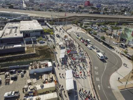 November 26, 2018 - San Ysidro, CA, United States of America - Members of the migrant caravan march toward the San Ysidro border crossing as they attempted to illegally cross into the United States November 26, 2018 in San Ysidro, California. Border agents shutdown the crossing and responded with tear gas to disperse the group. San Ysidro United States of America - ZUMAp138 20181126_zaa_p138_014 Copyright: xManixAlbrechtx