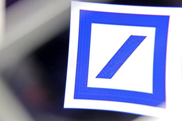 Razzi at Deutsche Bank Suspicion of money laundering Deutsche Bank logo on a PC monitor viewed through a magnifying glass Deutsche Bank logo website on 29 11 2018 in Siegen Germany No property release No Trademark rights