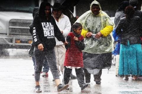 Members of the Central American migrant caravan walk in the rain after the shelter where they were staying got flooded due to the heavy rains, in Tijuana, Mexico, 29 November 2018. The situation of the Central Americans stuck at the Tijuana border entered a new stage of waiting as the new government of Andres Manuel Lopez Obrador will be made official next Saturday. Central Americans await AMLO s oath of office in Mexico !ACHTUNG: NUR REDAKTIONELLE NUTZUNG!  Copyright: xAlejandroxZepedax AME2622 20181130-636791397631335790
