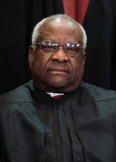 Supreme Court Associate Justice Clarence Thomas poses during the official Supreme Court group portrait at the Supreme Court on November 30, 2018 in Washington, D.C.  WAP20181130307 KEVINxDIETSCH