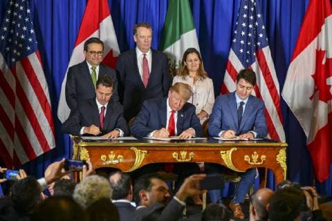 November 30, 2018 - Buenos Aires, Argentina - U.S. President Donald Trump, center, Canadian Prime Minister Justin Trudeau, right, and Mexican President Enrique Pena Neto, left, during a signing ceremony for the new NAFTA trade agreement called USMCA November 30, 2018 in Buenos Aires, Argentina. Buenos Aires Argentina - ZUMAp138 20181130_zaa_p138_007 Copyright: xRonxPrzysuchax