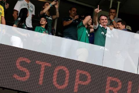 The elected president of Brazil, Jair Bolsonaro, wearing the Palmeiras Club shirt, greets supporters before the start of the match between Palmeiras and Vitoria for the Brazilian soccer championship, at the Allianz Parque stadium in Sao Paulo, Brazil, 02 December 2018. Palmeiras was proclaimed last Sunday, November 25, the Brazilian league champion for the tenth time and got it one date before the end of the tournament after beating Vasco da Gama at home by 1-0. Bolsonaro will assume the Brazilian Presidency next 01 January. Bolsonaro attends the match of the proclaimed champion of the Brazilian League, Palmeiras, against Vitória in Sao Paulo !ACHTUNG: NUR REDAKTIONELLE NUTZUNG!  Copyright: xSebastiaoxMoreirax AME4423 20181202-636793809246634414