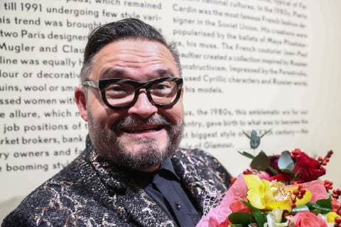 MOSCOW, RUSSIA - DECEMBER 4, 2018: Russian fashion historian Alexandre Vassiliev at the opening of his exhibition titled The Glamour of the 80s VDNKh exhibition centre. Mikhail Tereshchenko TASS  TS099C89