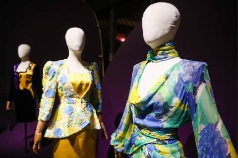 MOSCOW, RUSSIA - DECEMBER 4, 2018: Costumes on display at an exhibition titled The Glamour of the 80s by Russian fashion historian Alexandre Vassiliev opened at the VDNKh exhibition centre. The exhibition shows a unique collection of the 1980s costumes by Chanel, Christian Dior, Yves Saint Laurent, Givenchy, Pierre Balmain, Claude Montana, and other fashion houses. Mikhail Tereshchenko TASS  TS099CBF