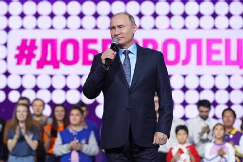 MOSCOW, RUSSIA - DECEMBER 5, 2018: The President of Russia Vladimir Putin at the 2018 Dobrovolets Rossii (Volunteer of Russia) award ceremony at CSKA Arena on International Volunteer Day; the event is part of the 2018 International Volunteer Forum. Mikhail Klimentyev Russian Presidential Press and Information Office TASS  TS099E2E