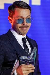 MOSCOW, RUSSIA - DECEMBER 5, 2018: Actor Pavel Derevyanko receibes, winner of the Actor of the Year award, during a ceremony to present the Event of the Year 2018 prize held by the Cinema Reporter magazine at Illusion Cinema. Cinema Reporter is a new magazine that was established by the editorial staff of the Russian version of The Hollywood Reporter magazine. Artyom Geodakyan TASS  TS099F63