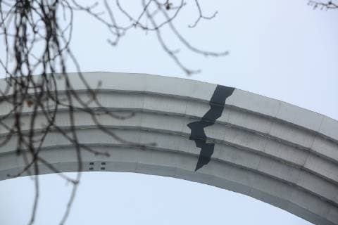 December 3, 2018 - Kiev, Ukraine - A huge Soviet-era arch in Kyiv, Ukraine, December 3, 2018, symbolizing Ukraine and Russia s friendship and union, where an unknown artist added a crack following recent tensions. Tensions between Ukraine and Russia appeared on November 25, when Russian forces seized three Ukranian navy vessels and its crew. Ukraine imposed martial law for 30 days in 10 regions that border Russia, the Black Sea and the Azov Sea on November 28. Kiev Ukraine  - ZUMAn230 20181203_zaa_n230_760 Copyright: xSergiixKharchenkox