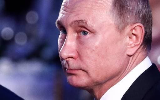 MOSCOW, RUSSIA - DECEMBER 7, 2018: The President of Russia Chairman of the Board of Trustees of the Russian Geographical Society, Vladimir Putin at the 2018 Russian Geographical Society Prize award ceremony at the State Kremlin Palace. Anton Novoderezhkin TASS  TS09A4F5