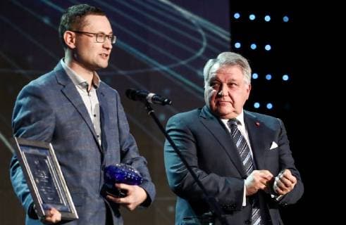 MOSCOW, RUSSIA - DECEMBER 7, 2018: Geobotanist Alexei Seryogin of Lomonosov Moscow State University (L) receives a 2018 Russian Geographical Society Prize in the Best Scientific Project category as Kurchatov Institute director Mikhail Kovalchuk looks on during the award ceremony at the State Kremlin Palace. Anton Novoderezhkin TASS  TS09A4F2