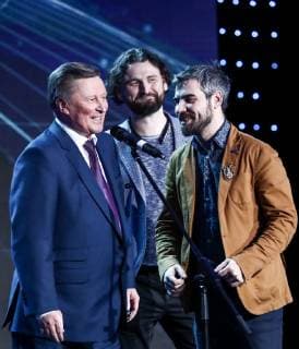 MOSCOW, RUSSIA - DECEMBER 7, 2018: Maxim Todorov (C) and Dmitry Ioffe (R) of the Chistye Igry enrvironmental educational project receive the 2018 Russian Geographical Society Prize in the Best Nature Protection Project category from the Special Representative of the President of Russia for Environmental Protection, Ecology and Transport Sergei Ivanov at the award ceremony at the State Kremlin Palace. Anton Novoderezhkin TASS  TS09A511
