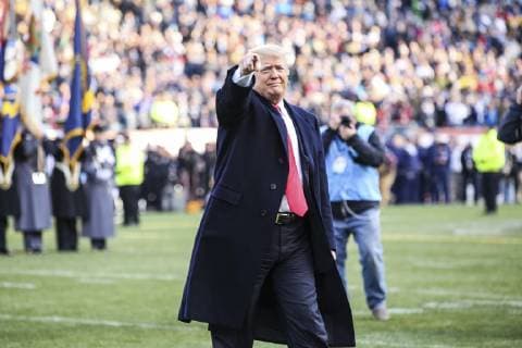 December 8, 2018 - Philadelphia, PA, United States of America - U.S President Donald Trump walks on to the middle of the playing field before the 119th Army Navy game at Lincoln Financial Field December 8, 2018 in Philadelphia, Pennsylvania. Philadelphia United States of America - ZUMAp138 20181208_zaa_p138_010 Copyright: xJohnxPellinox