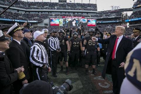 December 8, 2018 - Philadelphia, PA, United States of America - U.S President Donald Trump, right, performs the traditional coin toss before the 119th Army Navy game at Lincoln Financial Field December 8, 2018 in Philadelphia, Pennsylvania. Philadelphia United States of America - ZUMAp138 20181208_zaa_p138_008 Copyright: xElliottxFabriziox