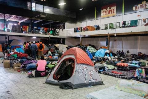 El Barretal shelter in Tijuana, Mexico on December 9, 2018. El Barretal is located 30 minutes from the San Ysidro border, located in the eastern part of Tijuana. The shelter is an abandoned concert hall that has the capacity to house 7,500 people but it s not even half full.  TJ2018120913 ARIANAxDREHSLER