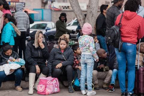 Asylum seekers wait for their number to be called at El Chaparral in Tijuana, Mexico on December 10, 2018. The amount of numbers that are called change daily. This morning 25 numbers were called and later in the day another 25 will be announced.  TJ2018121008 ARIANAxDREHSLER