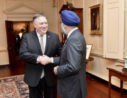 December 14, 2018 - Washington, DC, United States of America - U.S. Secretary of State Mike Pompeo, left, welcomes Canadian Minister of Defense Harjit Sajjan prior to the start of the U.S. Ã¢â‚¬ Canada 2+2 Ministerial meeting at the Department of State December 14, 2018 in Washington, D.C. Washington United States of America - ZUMAp138 20181214_zaa_p138_002 Copyright: xMichaelxGrossx
