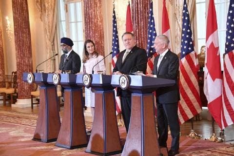 December 14, 2018 - Washington, DC, United States of America - U.S. Secretary of State Mike Pompeo, and U.S. Defense Secretary Jim Mattis, right, during a joint press conference with Canadian Minister of Defense Harjit Sajjan and Canadian Foreign Minister Chrystia Freeland, left, following the U.S. †Canada 2+2 Ministerial meeting at the Department of State December 14, 2018 in Washington, D.C. Washington United States of America - ZUMAp138 20181214_zaa_p138_006 Copyright: xMichaelxGrossx