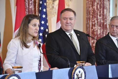 December 14, 2018 - Washington, DC, United States of America - Canadian Foreign Minister Chrystia Freeland, left, answers a question as U.S. Secretary of State Mike Pompeo, and U.S. Defense Secretary Jim Mattis, right, look on during a joint press conference following the U.S. †Canada 2+2 Ministerial meeting at the Department of State December 14, 2018 in Washington, D.C. Washington United States of America - ZUMAp138 20181214_zaa_p138_008 Copyright: xMichaelxGrossx