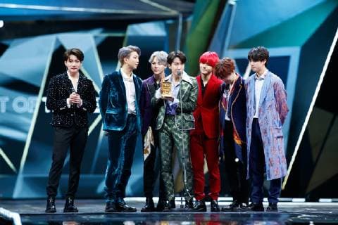 Members of South Korean boy band BTS, also known as the Bangtan Boys, pose with their trophy during the 2018 Mnet Asian Music Awards or MAMA in Hong Kong, China, 14 December 2018. BTS boys hot up 2018 Mnet Asian Music Awards in Hong Kong  20181215_82195