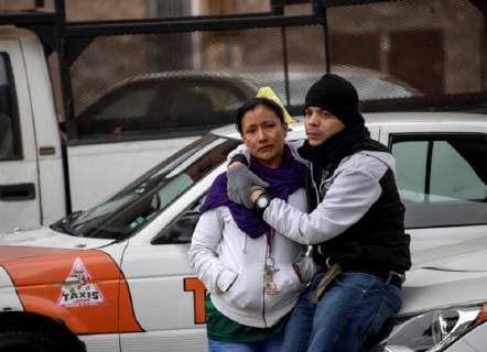 A couple of migrants waits outside of the El Chaparral border office in Tijuana, Mexico, 21 December 2018. President Andres Manuel Lopez Obrador earlier on 21 December said that Mexico will safeguard the human rights of Central American migrants who are trying to obtain asylum in the United States. Mexican officials say that the northwestern border city of Tijuana is currently harboring 4,000 Central Americans who were part of the caravans that set out in October from Honduras and Guatemala with the aim of reaching the US. Mexican President affirms to defend migrant rights !ACHTUNG: NUR REDAKTIONELLE NUTZUNG!  Copyright: xALONSOxROCHINx AME1379 20181222-636810369807395033
