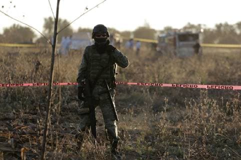 (181225) -- PUEBLA, Dec. 25, 2018 () -- A security member works at the helicopter crash site in Coronango, Puebla, Mexico, Dec. 24, 2018. The governor of Mexico s central state of Puebla, Martha Erika Alonso, and her husband Rafael Moreno Valle, ex-governor of the state, were killed in a helicopter crash on Monday, the head of the National Action Party Marko Cortes confirmed. ( Str) (rtg) MEXICO-PUEBLA-ACCIDENT-HELICOPTER CRASH XINHUA