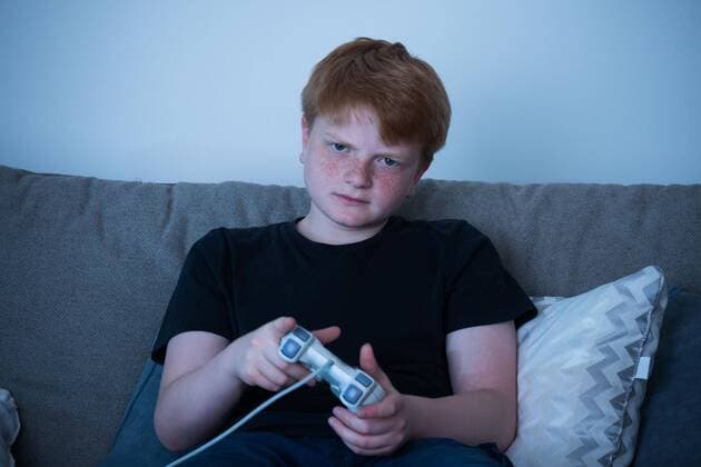  Boy Playing Videogames model released Symbolfoto  Copyright: xAndreyPopovx Panthermedia18189014