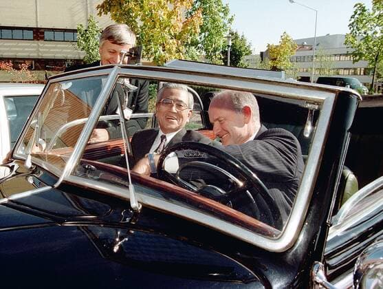 The chairman of board of directors of the German Volkswagen AG Ferdinand Piech, right, and the chairman of the Japanese Toyota Motor Corporation Shoichiro Toyoda, cetre, are sitting in an old German car Horch builded in 1939 during a visit of the Volkswagen plant in the Saxony city Mosel, Germany, Monday, Oct. 6, 1997. Toyoda leads a delegation of the Japanese trade association Keidanren. Left the Saxony minister of economy Hajo Schommer.( Eckehard Schulz) MOSEL DEU *** The chairman of board of directors of the German Volkswagen AG Ferdinand Piech right and the chairman of the Japanese Toyota Motor Corporation Shoichiro Toyoda cetre are sitting in an old German car Horch builded in 1939 during a visit of the Volkswagen plant in the Saxony city Mosel Germany Monday Oct 6 1997 Toyoda leads a delegation of the Japanese trade asso