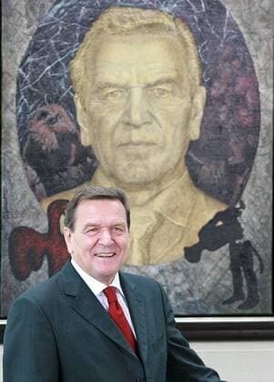 Former Federal Chancellor Gerhard Schröder stands in front of his portrait at the Federal Chancellery in Berlin on Tuesday 10 July 2007 The picture for the Chancellors Gallery was painted by Joerg Immendorf Eckehard Schulz BERLIN DEU