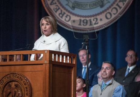 January 1, 2019 - U.S. - New Mexico Governor Michelle Lujan Grisham gives her inaugural address after she received her oath of office during a ceremony in Santa Fe, Tuesday January 1, 2019. Behind them upper right, is Congressman Ben Ray Lujan, left. U.S. - ZUMAab1_ 20190101_zaf_ab1_016 Copyright: xEddiexMoorex