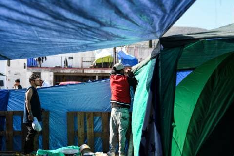 (190110) -- TIJUANA, Jan. 10, 2019 -- Migrants are in a temporary transit center for migrants from Central America in Tijuana, Mexico, Jan. 9, 2019. A large number of migrants from Central America gathered in Mexican border city Tijuana wishing to enter the United States. ) MEXICO-TIJUANA-MIGRATION-CENTRAL AMERICA-U.S. XinxYuewei 
