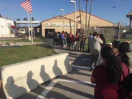 Pedestrians line up for U.S. immigration between Matamoros, Mexico and Brownsville, Texas on January 10, 2019, the day of President TrumpÕs visit to the Border in Brownsville, Texas.  MBX20190110202 PATRICKxTIMMONS