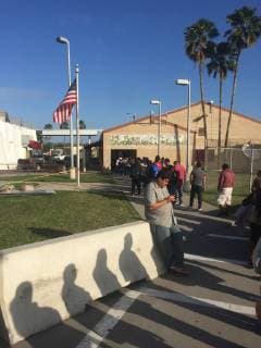Pedestrians line up for U.S. immigration between Matamoros, Mexico and Brownsville, Texas on January 10, 2019, the day of President Trump?s visit to the Border in Brownsville, Texas.  MBX20190110201 PATRICKxTIMMONS