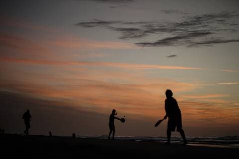 January 12, 2019 - Gaza, Palestine - Palestinians seen playing tennis at sunset on the beach at the sea of Gaza City. Gaza Palestine - ZUMAs197 20190112_zab_s197_057 Copyright: xMohamedxZarandahx