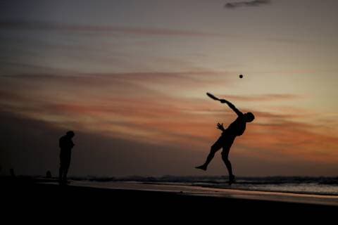 January 12, 2019 - Gaza, Palestine - A Palestinian seen playing tennis at sunset on the beach at the sea of Gaza City. Gaza Palestine - ZUMAs197 20190112_zab_s197_052 Copyright: xMohamedxZarandahx