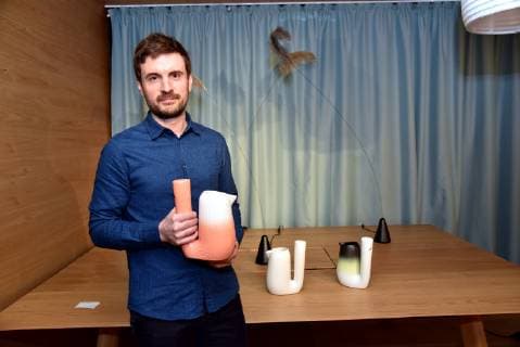 The French designer Pierre Charrie winner of the A W Designer of the Year Award 2019 young designer award poses with his Pan musical carafe on 13 01 2019 in Cologne