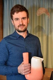 The French designer Pierre Charrie winner of the A W Designer of the Year Award 2019 young designer award poses with his Pan musical carafe on 13 01 2019 in Cologne