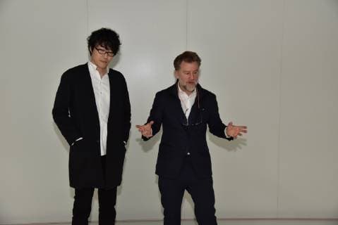 The Japanese designer Oki Sato alias NENDO winner of the A W Designer of the Year 2019 Prize l and Jörn Frederic Kengelbach Editor-in-Chief A W Architektur Wohnen r poses in Cologne on 13 01 2019