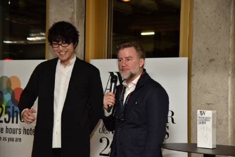 The Japanese designer Oki Sato alias NENDO winner of the A W Designer of the Year 2019 Prize l and Jörn Frederic Kengelbach Editor-in-Chief A W Architektur Wohnen r poses in Cologne on 13 01 2019