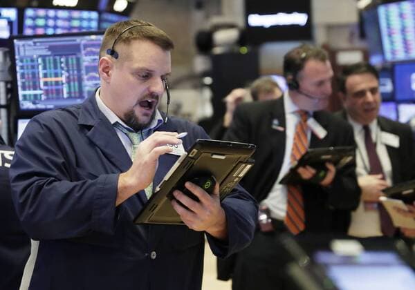 Traders work on the floor of the NYSE at the opening bell at the New York Stock Exchange on Wall Street in New York City on January 16, 2019. After early trading the Dow Jones Industrial average rose over 100 points.  NYP20190116105 JOHNxANGELILLO