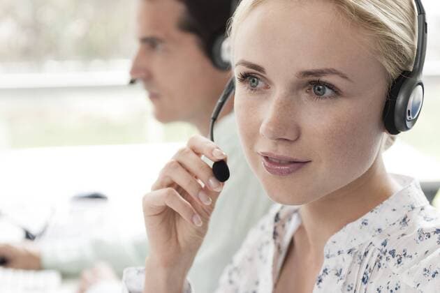 Call center operators provide daily customer service  Copyright: OdilonxDimier B44073928