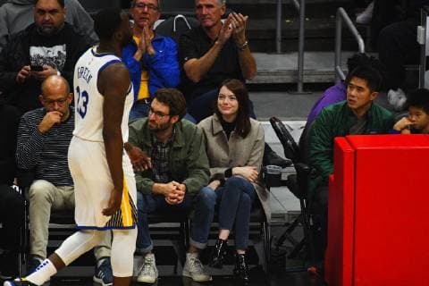 LOS ANGELES, CA - JANUARY 18: Actress Emma Stone and her boyfriend Dave McCary look on as Golden State Warriors Forward Draymond Green (23) walks to the bench during a NBA game between the Golden State Warriors and the Los Angeles Clippers on January 18, 2019 at STAPLES Center in Los Angeles, CA. (Photo by Brian Rothmuller Icon Sportswire) 313688