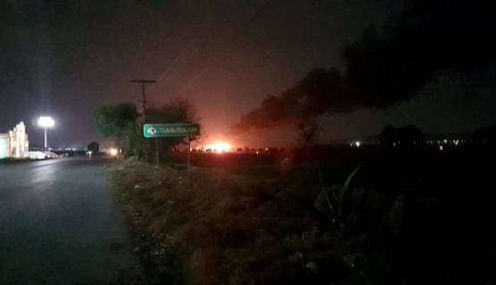 (190119) -- HIDALGO, Jan. 19, 2019 () -- MEXICO-HIDALGO-ACCIDENT-EXPLOSION Photo taken with a mobile device shows smoke columns at the site of an explosion in the municipality of Tlahuelilpan, Hidalgo state, Mexico, Jan. 18, 2019. At least 20 people were killed and 54 others injured in a pipeline explosion in the central Mexican state of Hidalgo on Friday, local authorities said. () MEXICO-HIDALGO-ACCIDENT-EXPLOSION Xinhua 