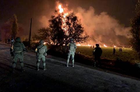 (190119) -- HIDALGO, Jan. 19, 2019 () -- MEXICO-HIDALGO-ACCIDENT-EXPLOSION Photo taken with a mobile device shows army working at the site of an explosion in the municipality of Tlahuelilpan, Hidalgo state, Mexico, Jan. 18, 2019. At least 20 people were killed and 54 others injured in a pipeline explosion in the central Mexican state of Hidalgo on Friday, local authorities said. () MEXICO-HIDALGO-ACCIDENT-EXPLOSION Xinhua 