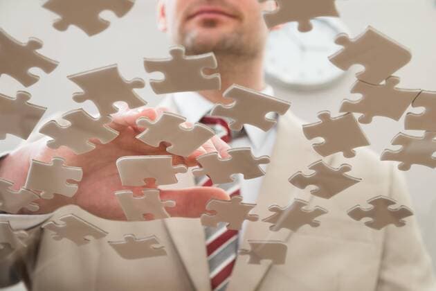  Businessman Separating Puzzle model released Symbolfoto  Copyright: xAndreyPopovx Panthermedia14062403